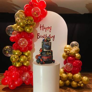 Red And Gold Luxe Birthday Arch Setup