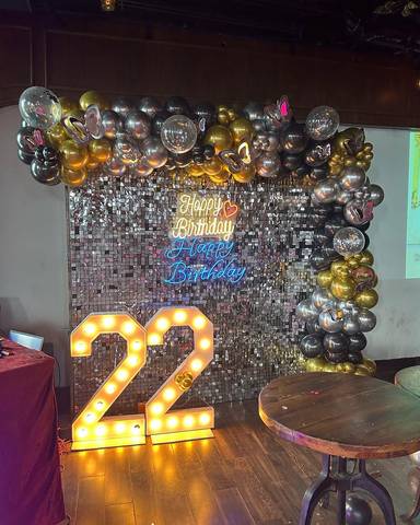 The shimmering silver sequin backdrop