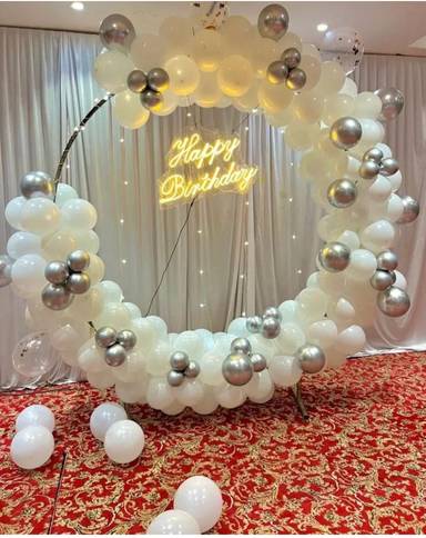 Elegant White And Silver Birthday Arch