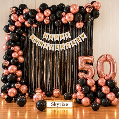 Rose Gold Black Anniversary Balloon Arch